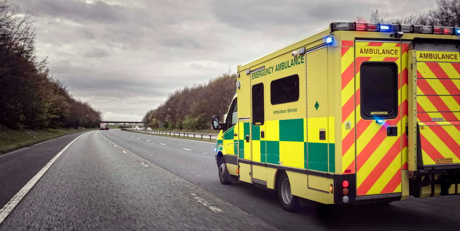 Ambulance on the motorway representing C1 ambulance driver training Pole Position