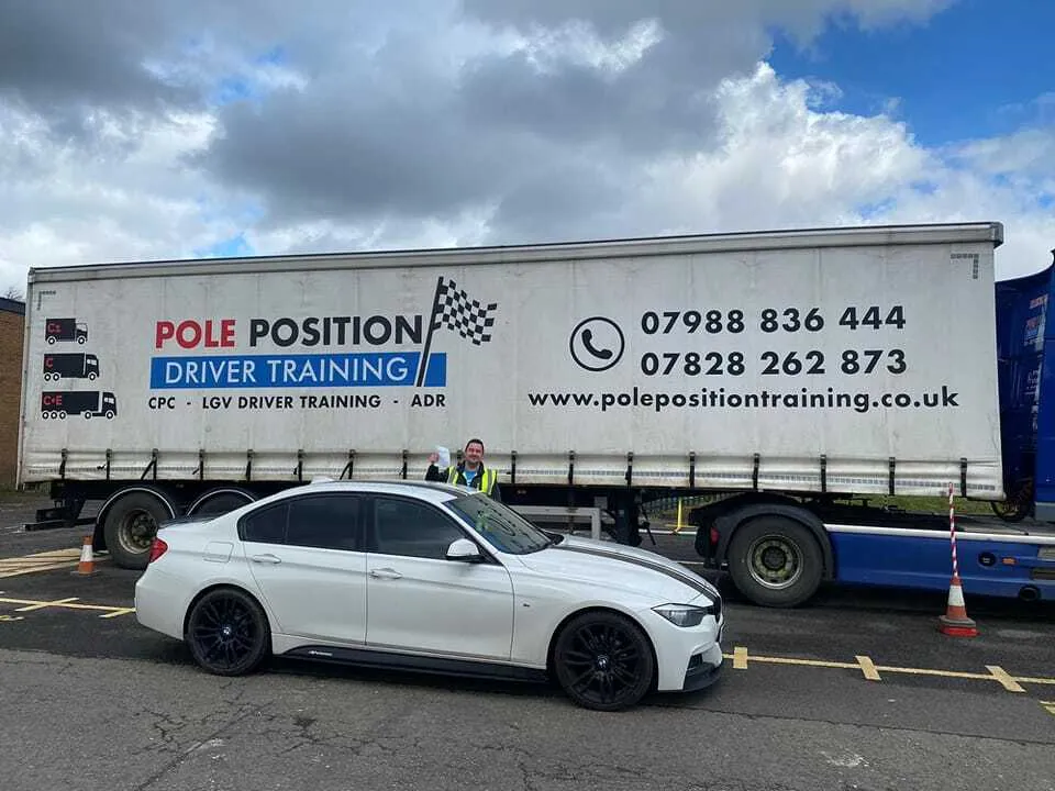 Pole Position branded curtain side trailer and car at the Livingston training centre